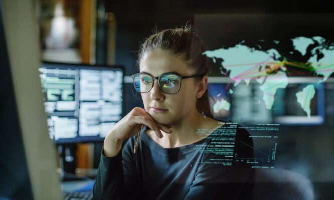 Research - woman looking at screen of data